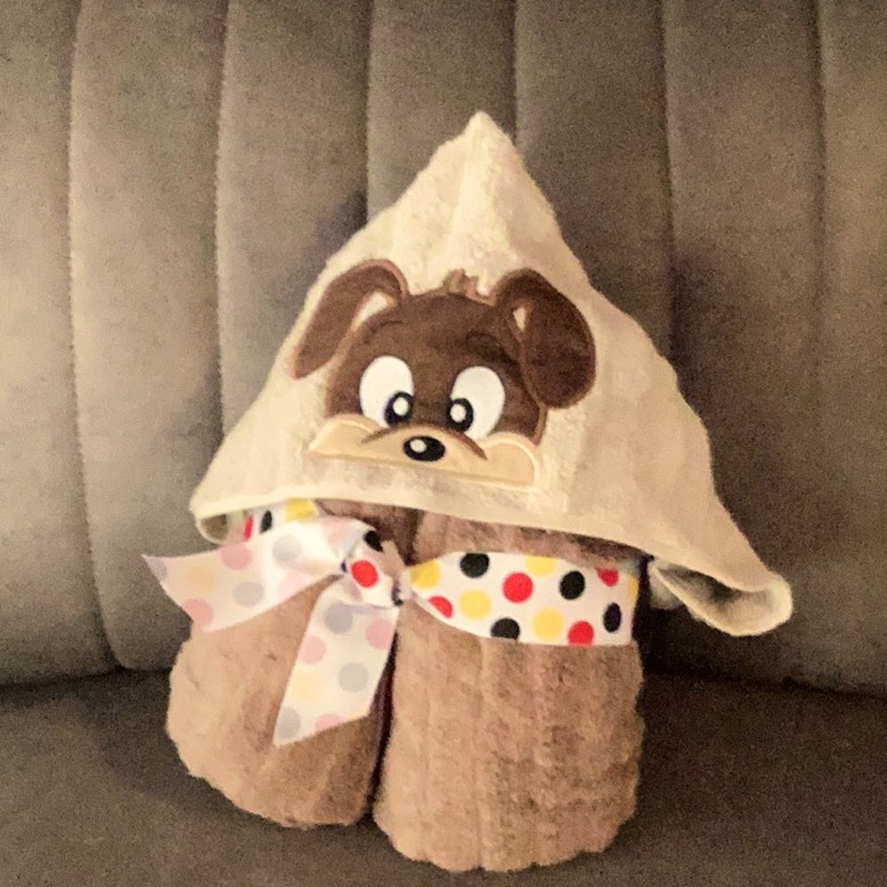 Generous size, hooded puppy towel for bath, beach, or pool.
